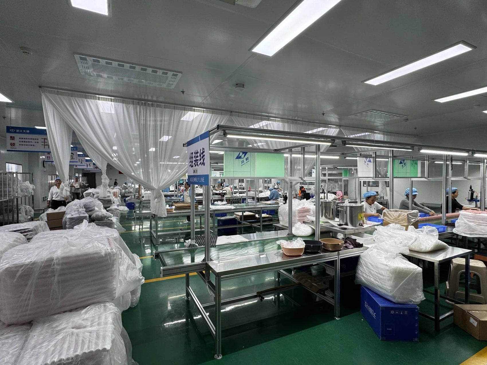 Staff and workstations on the packaging assembly line
